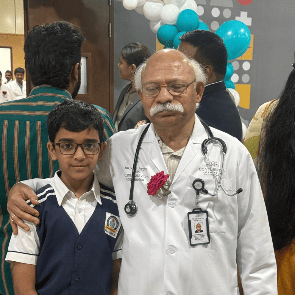 A Guru Dronacharya Pathshala student with a doctor during a school health and wellness event.